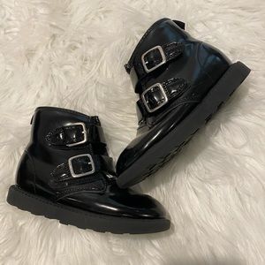 Girls size 11 black patent leather boots.  Cute side buckle and zipper details.